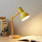 Lampe en bois articulée avec une teinte jaune douce, design épuré, pour apporter une touche lumineuse à votre décoration bohème.