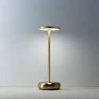 Lampe de table minimaliste en métal laiton doré, tige cylindrique, base galet, H27 cm