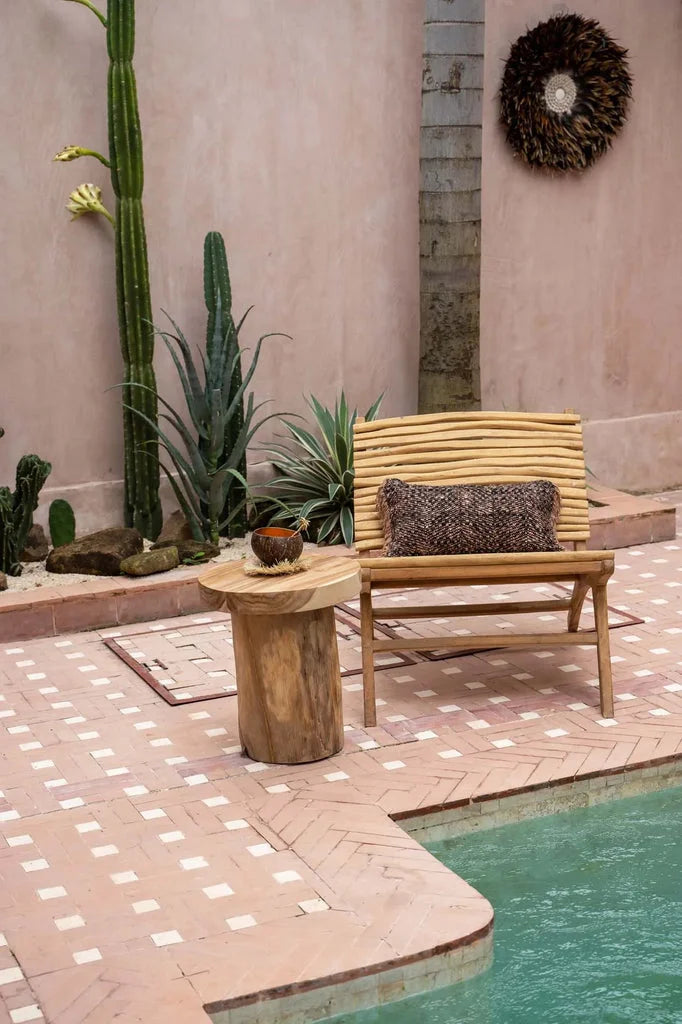 Chaise en rotin avec coussin à motif pour le produit LIslander Naturel