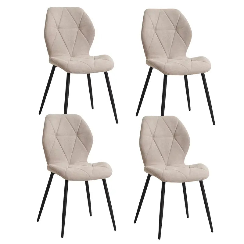 Lot de 4 chaises en tissu blanc avec pieds en métal noir, style moderne.