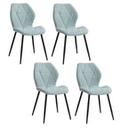 Lot de 4 chaises en tissu bleu avec piètement noir, idéales pour une salle à manger moderne.