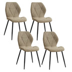 Lot de 4 chaises en tissu vert avec piètement noir, idéales pour une salle à manger moderne.
