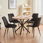 Lot de 4 chaises en velours noires en situation déco