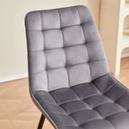 Zoom sur l'assise capitonnée du lot de 4 chaises en velours