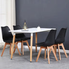 Lot de 6 chaises scandinaves noires dans une salle à manger élégante