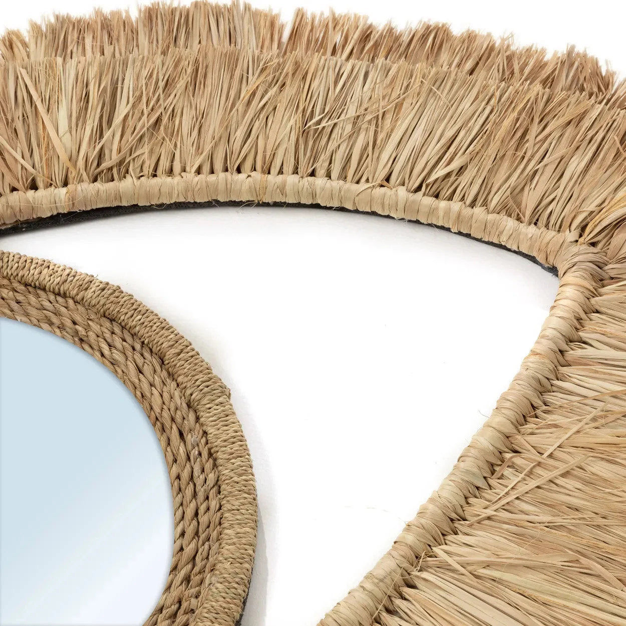 Miroir mural en raphia forme œil avec frange naturelle et cadre en corde tressée