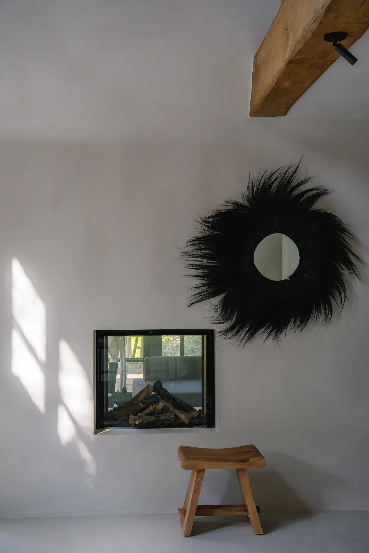 Miroir mural en rayung noir 100 cm – Modèle Simba
