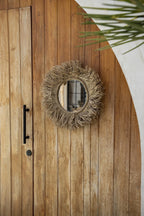 Miroir mural rond en fibres naturelles tressées avec frange de paille, diamètre 60 cm