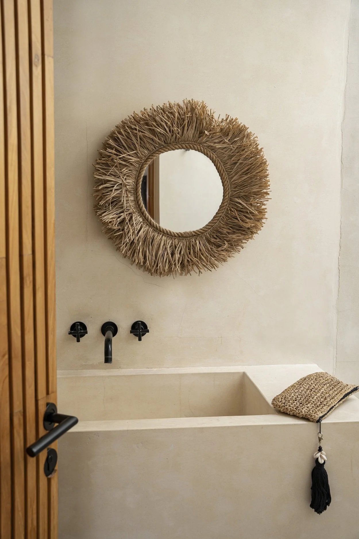 Miroir mural rond en fibres naturelles tressées avec franges en paille, diamètre 60 cm