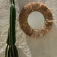 Miroir mural rond en raphia naturel et coquillages 60 cm