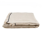 Nappe en lin beige plié bord noir frangé 150x250 cm