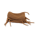 Pile de sacs en jute marron avec cordons pour le produit La nuance carrée Coco Naturelle