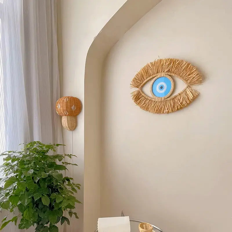 Oeil mural bleu pâle en fibres naturelles, pour un décor zen et protecteur