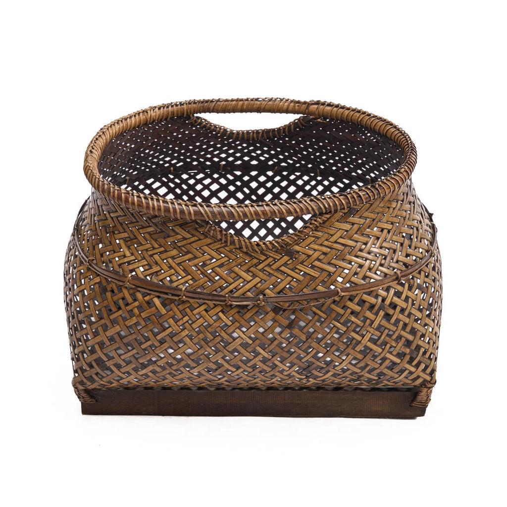 Panier de rangement en rotin ajouré brun miel avec base bois foncé