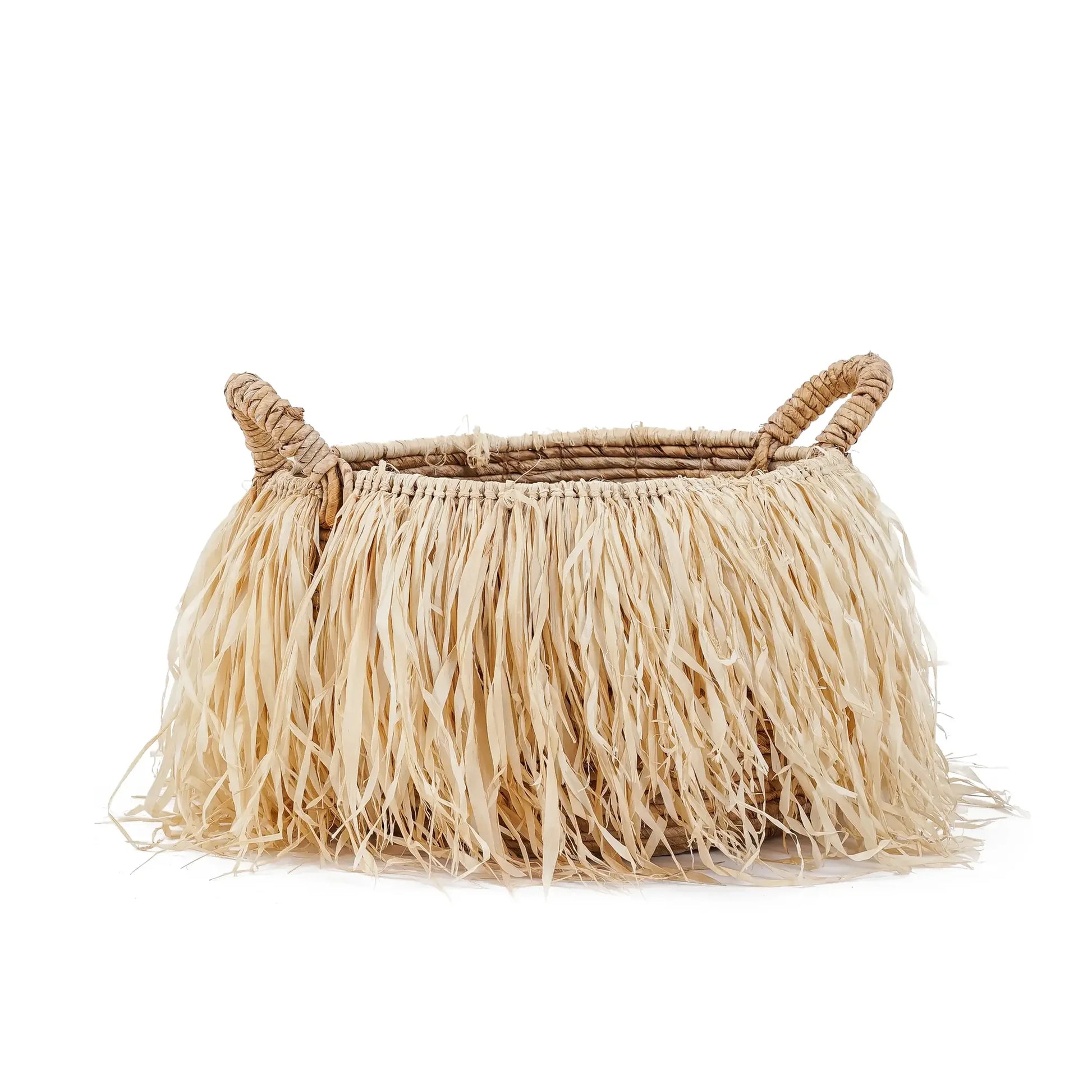 Panier en raphia naturel avec frange de rafia et décoration feuillage