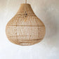 Suspension en tissage naturel pour un éclairage chaleureux et élégant dans la maison