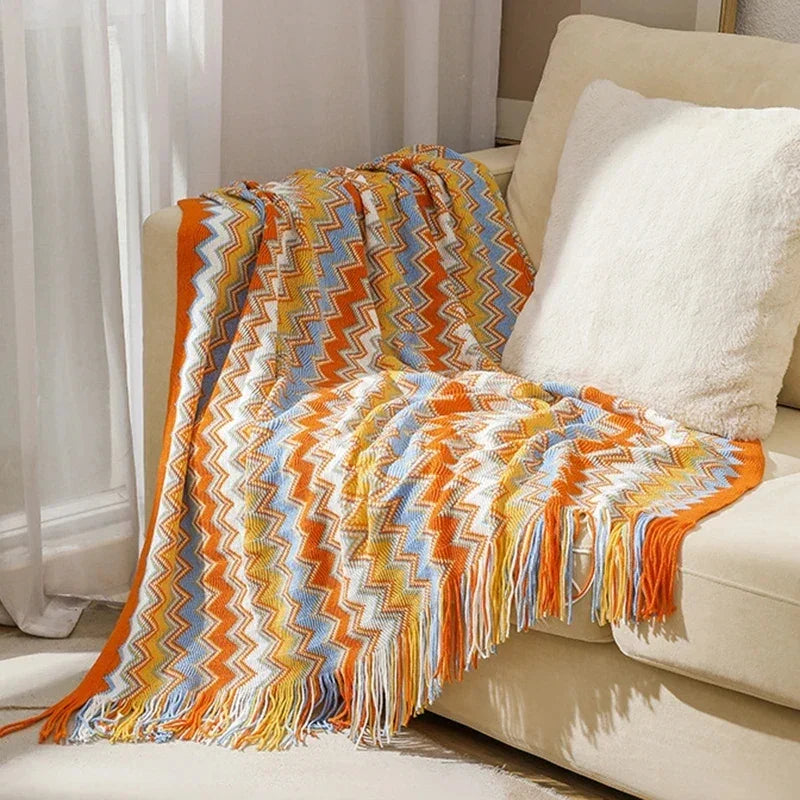 Couverture à zigzag coloré en plaid chevron, parfaite pour des moments cocooning