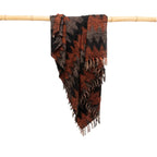 Écharpe à franges en coton tissé noir et orange avec motif géométrique et motif