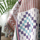 Plaid nordique coloré avec franges multicolores, parfait pour la déco de salon ou chambre