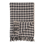 Plaid tissé pied-de-poule noir et beige à franges pour canapé