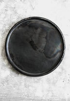 Plaque de cuisson ronde en fonte noire avec finition mate, diamètre 26 cm