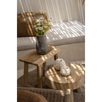 Table basse en bois ronde à fini naturel avec porte-bougie coquillages floraux