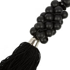 Porte-clés pompon en perles de bois noir avec capuchon métallique argenté
