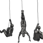 Sculpture murale grimpeur en résine