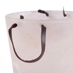 Seau à glace en résine marbrée crème translucide avec anses en cuir marron foncé