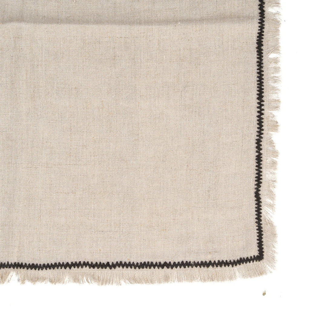 Serviette de table en lin naturel beige texturé avec bordure noire contrastante