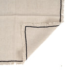 Serviette de table en lin naturel crème à bordure noire frangée