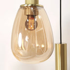 Suspension multiple en verre ambré et laiton doré pour éclairage chaleureux – 140x44 cm
