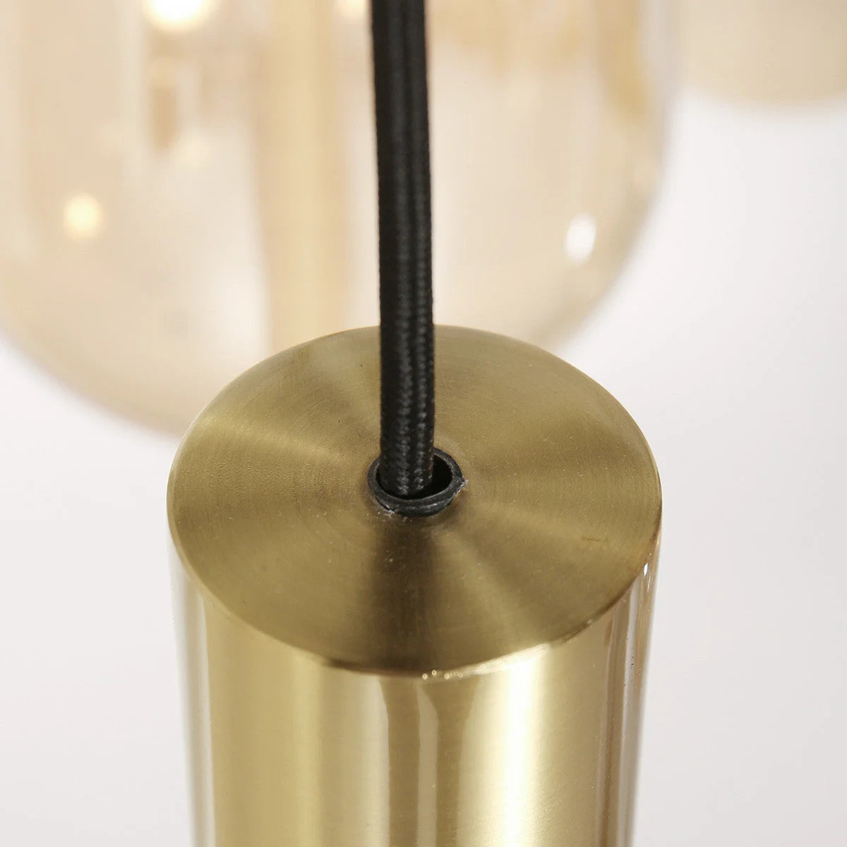 Suspension multiple en verre ambré et laiton doré pour éclairage chaleureux – 140x44 cm