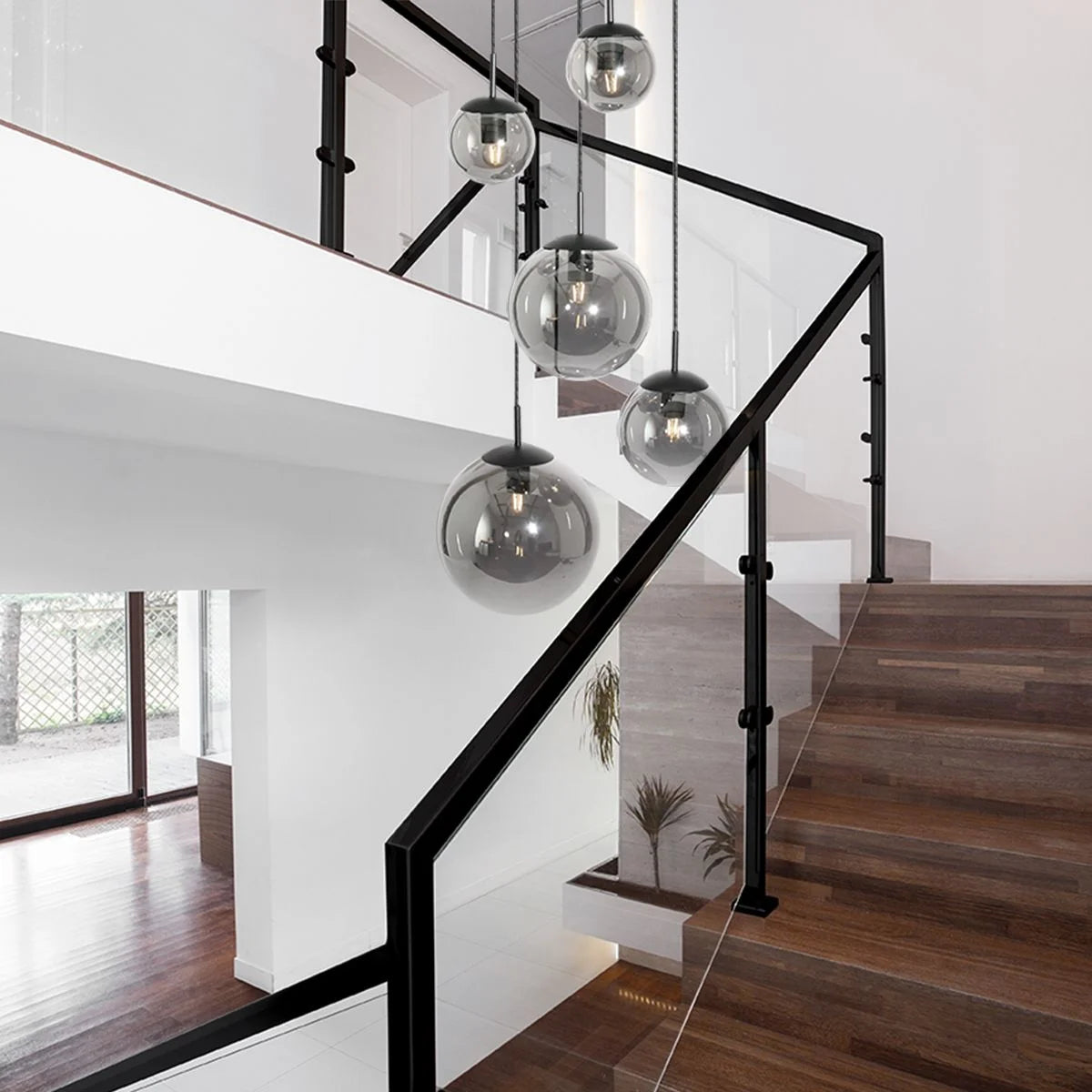 Suspension multiple en verre fumé noir boules dégradées Ø60 cm avec globes modernes en verre