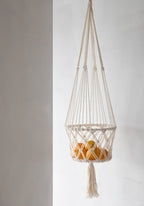 Panier à fruits en macramé suspendu en coton blanc cassé avec franges, H110 cm