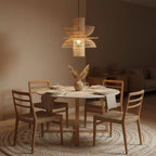 Suspension en rotin naturel ajourée forme fleur Ø65 cm avec lueur chaude