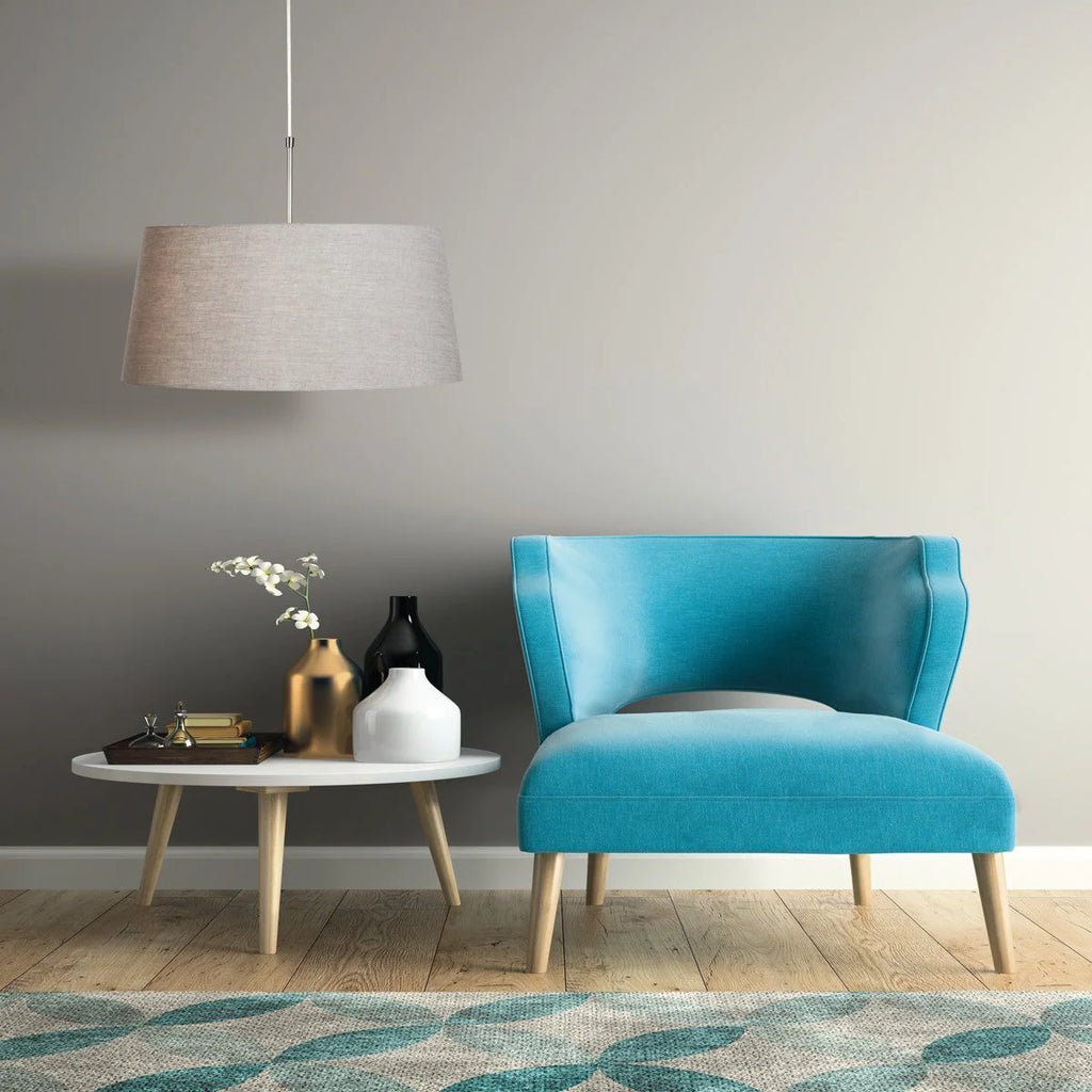 Fauteuil en velours turquoise avec pieds en bois clair, parfait pour Suspension tissu beige abat-jour évasé métal brossé Ø45 cm