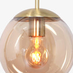 Suspension en verre ambré et métal doré avec ampoule visible – Ø20 cm