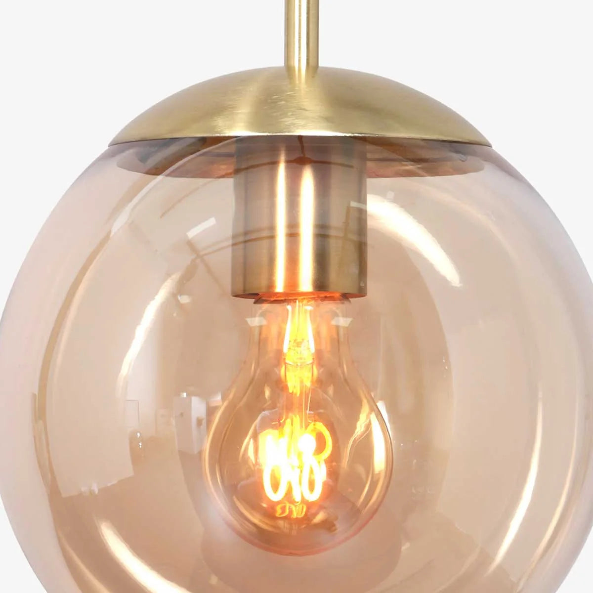 Suspension en verre ambre et métal doré forme sphère ø25 cm