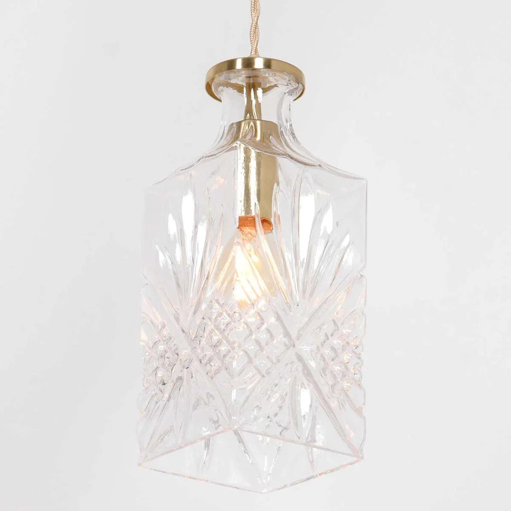 Suspension en verre facetté transparent avec motif en cristal et laiton doré
