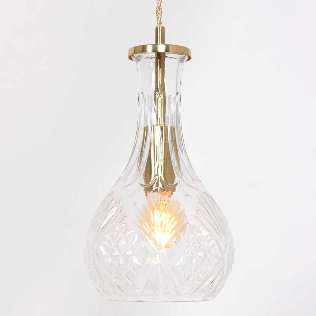 Suspension en verre taillé transparente avec fixation en laiton doré et ampoule à filament