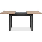 Table à manger extensible en bois clair et métal noir avec design moderne et flexible