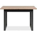 Table à manger extensible en bois clair et métal noir avec design minimaliste