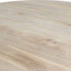 Table ronde en teck recyclé Ø120 cm avec sol en bois clair texturé