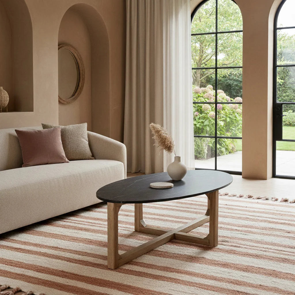 Table basse ovale en marbre noir et bois clair croisé, 120x60 cm