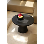 Table basse ronde en bois de suar noir avec base rainurée – Ø70 cm
