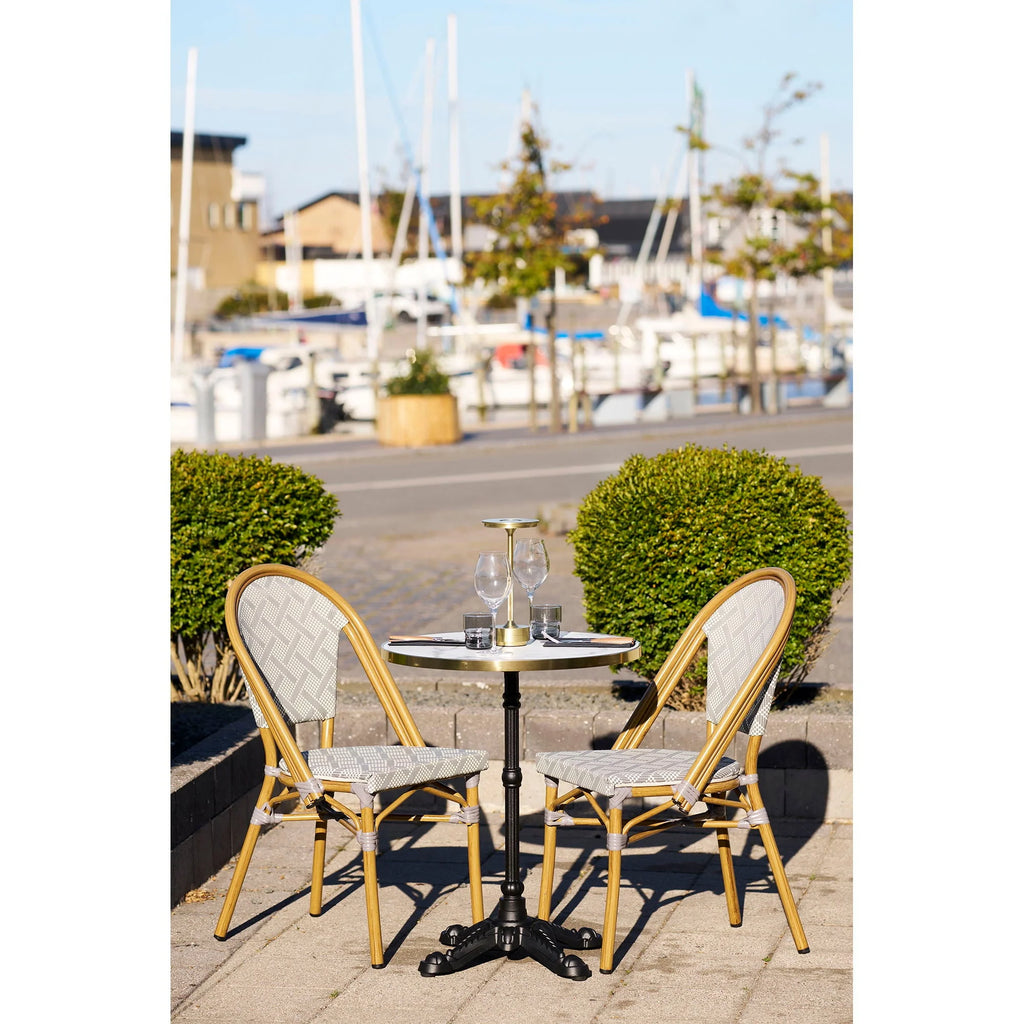 Table bistrot ronde effet marbre blanc bord doré pied noir Ø60 cm