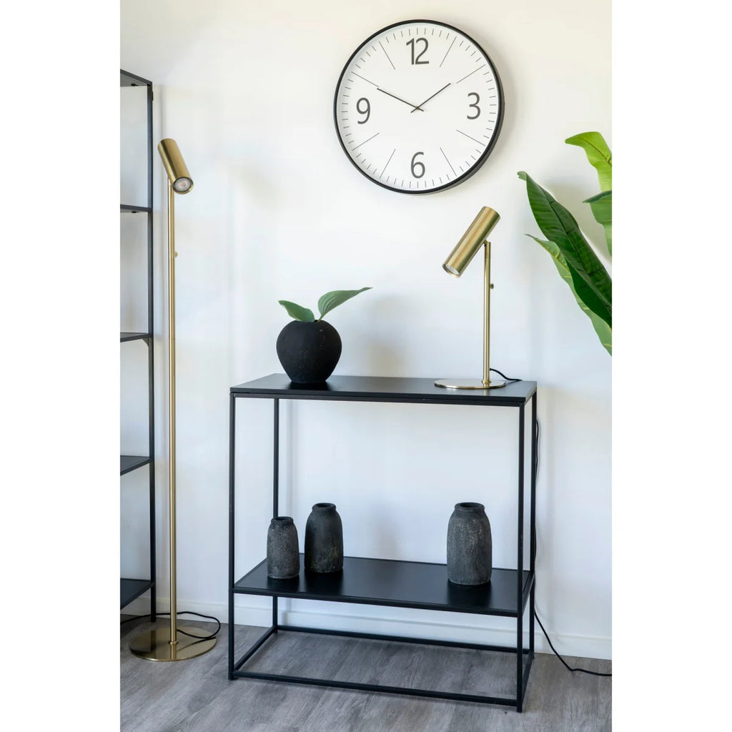 Table console noire minimaliste en métal avec étagères et vases