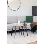 Table d’appoint moderne travertin beige et noir en MDF et acier