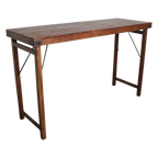 Table pliante en bois vintage brune avec piétement métal 170x60 cm
